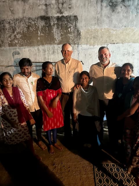 Photo of Indian family in front of a house church